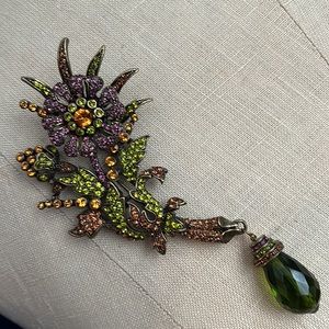 HEIDI DAUS purple & green flower pin with green stone drop.